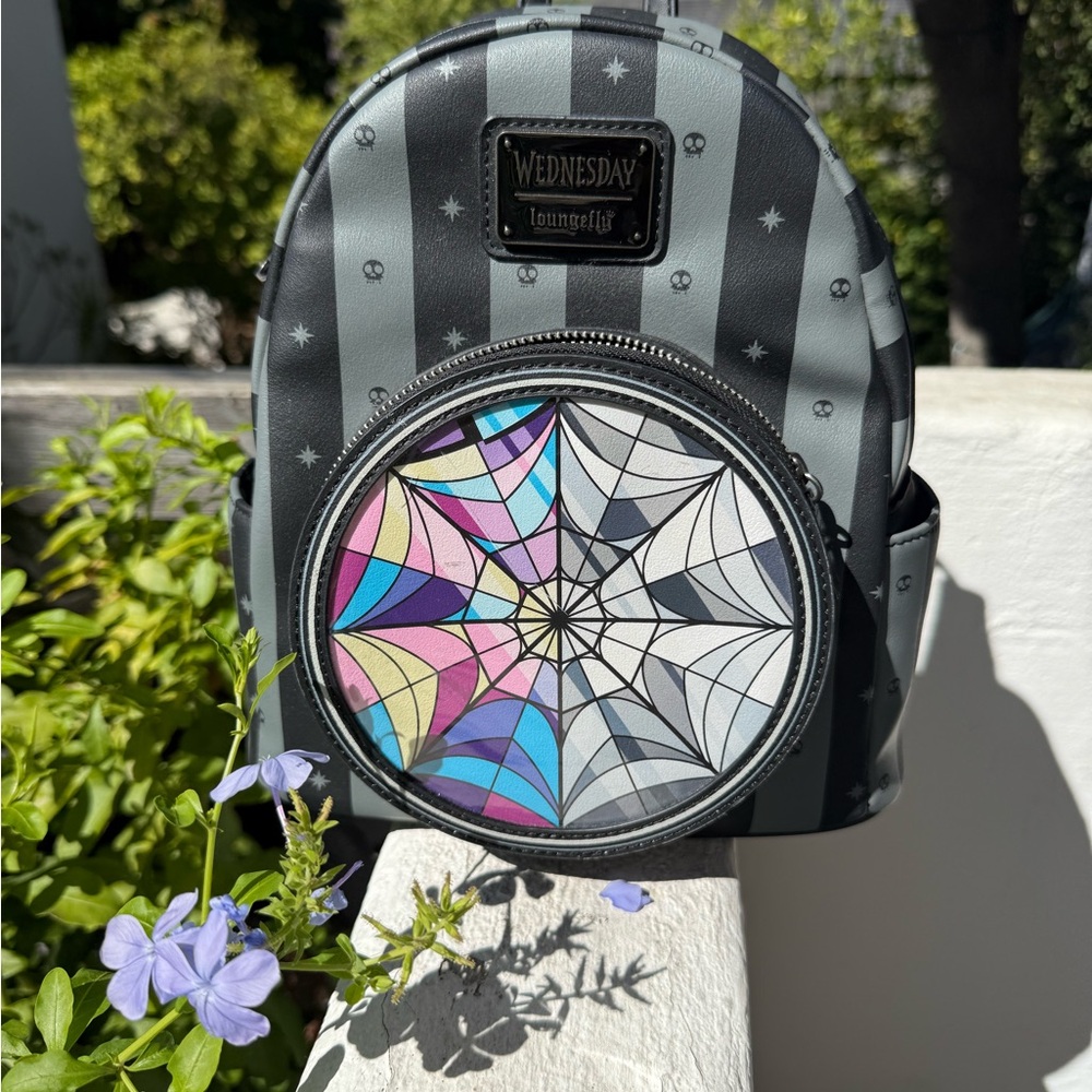 Loungefly Netflix Wednesday Gray and Black Backpack with Web window Design